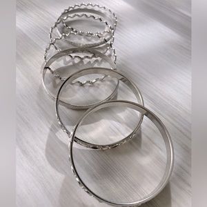 7 Silver bracelets